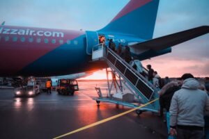 people boarding a plane